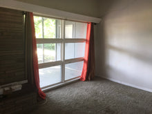 Load image into Gallery viewer, PENDING Mid-Century Modern 4/2/2 w/in-law,AIRBnB or subdivide Possibilities Have a unique chance to own an amazing flat roof 4/2/2 on a huge corner lot