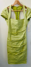 Load image into Gallery viewer, Nicole Miller Artelier pastel green figure flattering designer spring/summer dress.
