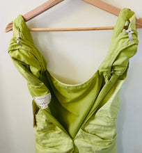 Load image into Gallery viewer, Nicole Miller Artelier pastel green figure flattering designer spring/summer dress.
