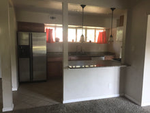 Load image into Gallery viewer, PENDING Mid-Century Modern 4/2/2 w/in-law,AIRBnB or subdivide Possibilities Have a unique chance to own an amazing flat roof 4/2/2 on a huge corner lot
