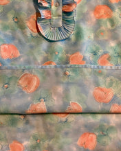 Load image into Gallery viewer, 1970’s Pykettes short sleeve ruffle and button floral lightweight blouse in immaculate condition.
