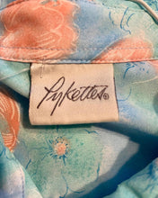 Load image into Gallery viewer, 1970’s Pykettes short sleeve ruffle and button floral lightweight blouse in immaculate condition.
